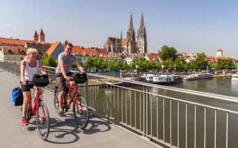 Bike path in Regensburg with view of the cathedral