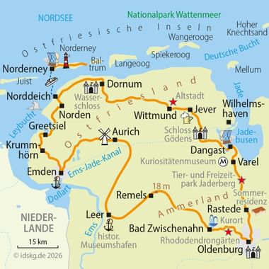 Cycling route map of East Frisia showing orange marked path through towns like Norderney, Emden, Aurich, Leer, and Oldenburg with North Sea coast.