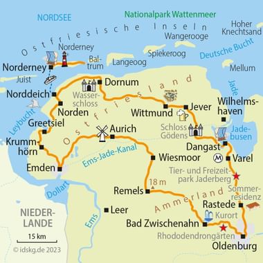 Cycling map of East Frisia showing orange marked round tour route connecting cities Emden, Aurich, Wittmund, Jever and coastal areas.